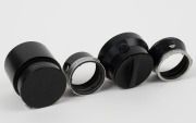 LEITZ: Four Leica lens hoods - one c. 1971 12508 R1.4/50 in black with rear cap, one c. 1956&nbsp;ITDOO in black and chrome, one c. 1956 ITOOY in black and chrome, and one c. 1951 TNGOO C2219 in black with rear cap.&nbsp;(4 items) - 2