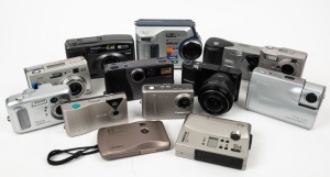 VARIOUS MANUFACTURERS: Thirteen digital cameras - one Samsung NX1000, one Pentax EI-C90 with maker's box and instruction booklet, one Kodak EasyShare CX6330, one Kodak DC25, one Sony MVC-FD100, one Fujifilm MX-700, one Sharp VE-LC1, one Mitsubishi DJ-1000