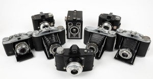 AGFA: Eight c. 1950s cameras - one Isolette II with Apotar lens, one Isolette II with Agnar lens, one Isolette V with Agnar lens, one Solinette II with Solinar lens, two Clack box cameras with differing typographic details, one made-in-Germany Click-I, an