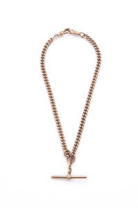 WATCH CHAIN: 9ct rose gold curb link watch chain with T-bar and swivels. 41.35 grams.