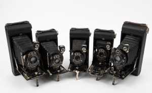 KODAK: Five c. late 1920s vertical-folding cameras - three No. 1 Pocket Kodaks with varying shutter, lens, and body details, together with two No. 1A Pocket Kodaks with differing lens and shutter details. (5 cameras)