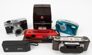 KODAK: Five cameras showcasing a range of technologies and eras - one Kodak Stereo Camera with double lens cap and Kodaslide Stereo Viewer I, one Instamatic Reflex, one Tele-Ektra 300 with wrist strap, one Ektralite 10 with leather case and wrist strap, a