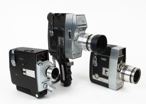 BELL & HOWELL: Three 8mm movie cameras - one Duolex-S with hand grip and lens hood, one Autoload 8 in black with hand grip, and one Director Series Zoomatic. (3 movie cameras)