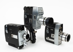 BELL & HOWELL: Three 8mm movie cameras - one Duolex-S with hand grip and lens hood, one Autoload 8 in black with hand grip, and one Director Series Zoomatic. (3 movie cameras)