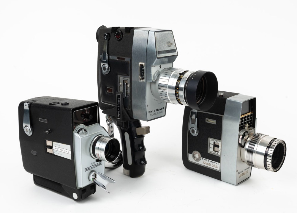 BELL & HOWELL: Three 8mm movie cameras - one Duolex-S with hand