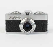 MEOPTA: Mikroma&nbsp;subminiature&nbsp;camera [#4310624],&nbsp;c. 1949, in black leatherette with Mirar&nbsp;20mm f3.5 lens [#4310624], together with leather case. - 2