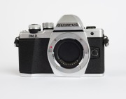 OLYMPUS: Twelve promotional items - two Olympus Pen dummy digital cameras, two Olympus OM-D dummy digital cameras, four black and two silver Olympus OM-1 miniatures sealed in retail packaging, one Olympus Mju&nbsp;camera stand, and one Olympus Mju point-of-sal - 3