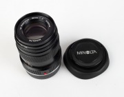 MINOLTA: Black M-Rokkor&nbsp;90mm f4 lens [#2012453] with Leica M bayonet mount, c. 1981, together with rubber lens hood, and front and rear lens caps. - 2