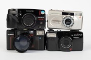 OLYMPUS: Four c. 1990s compact cameras - one black Superzoom 70 [#5147351], one silver&nbsp;Superzoom 80g [#6503378], one black Superzoom 110 [#1680900], and one black Quick Flash AFL-S [#1439369].&nbsp;(4 cameras) - 2