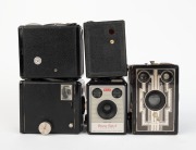 KODAK: Five c. 1940s box cameras - one Six-16 Brownie with metal Art Deco front plate, one Six-20 Brownie Junior, one Six-20 Brownie Model C, one Six-20 Brownie Model E, and one Brownie Flash II. (5 cameras) - 2