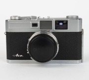 OLYMPUS: Circa 1958 Olympus-Ace rangefinder camera with E. Zuiko-W 35mm f2.8 lens, together with front lens cap. - 2