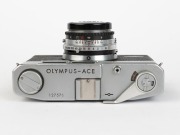 OLYMPUS: Circa 1958 Olympus-Ace rangefinder camera with E. Zuiko-W 35mm f2.8 lens, together with front lens cap. - 4