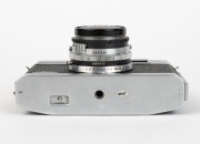 OLYMPUS: Circa 1958 Olympus-Ace rangefinder camera with E. Zuiko-W 35mm f2.8 lens, together with front lens cap. - 5