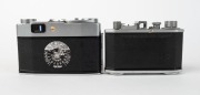 OLYMPUS: Two c. 1950s rangefinder cameras - one Olympus 35 Model 4 with Zuiko C. 40mm f3.5 lens, and one Olympus 35-S with E. Zuiko 48mm f2.8 lens. (2 cameras) - 3