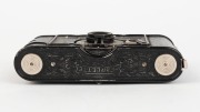 KONICA: Pearlette&nbsp;strut-folding camera, c. 1933,&nbsp;with sports finder and&nbsp;beautiful raised decorative elements on black crackle paint finish. - 5