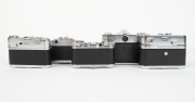 BRAUN: Five black and chrome c. 1950s 35mm cameras - one Paxette Reflex IB, one Paxette Super III with front lens cap, one Paxette Super II BL, one Paxette, and one Super Paxette with front lens cap. (5 cameras) - 3