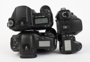 CANON: Three black digital SLR camera bodies with body caps - one c. 2002 Canon EOS-1Ds [#112850], one c. 2003 Canon EOS-10D [#396044], and one c. 2006 EOS D30 [#113400501], also known as the EOS 30D. (3 cameras) - 4