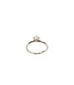 RINGS: Four 18ct gold diamond solitaire rings. 11.3 grams.