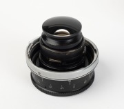 KIEV ARSENAL: Three c. 1990 bayonet-mount Soviet reproduction lenses - one Jupiter-9 85mm f2 [#8900407] with front and rear caps, one Jupiter-12 35mm f2.8 [#9110300] with front and rear caps&nbsp;in maker's plastic case, and one Jupiter-12 35mm f2.8 [#7001068] - 2