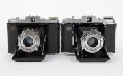 ZEISS IKON: Four c. 1950&nbsp;Nettar&nbsp;horizontal-folding cameras - one 517/16 [#G 42147] with Novar 75mm f6.3 lens and Vario shutter, one 518/16 [#C 92272] with Novar 75mm f4.5 lens and Prontor-SVS shutter, one 517/16 [#W 29277] with Novar 75mm f4.5 lens and Pr - 2