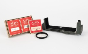 ALPA: Four camera accessories - three Alpa Reflex 'Panchro' lens filters in maker's boxes (one Filtrabe 40 1¼ UV, one Filtrabe 82A 1¼ blue with instruction sheet, and one Filtrabe 85 2 orange, also with instruction sheet), together with one c. 1952 USCONG tripod cradle. (4 items)