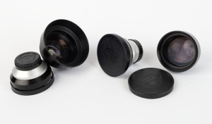NIPPON KOGAKU: Four Nikkorex lenses - one black and chrome Nikkorex-Wide f5.6 with front and rear caps, one all black Nikkorex-Tele f5.6 with front and rear caps, and two black and chrome Nikkorex-Tele f5.6 lenses, one with Nikkorex lens hood and one with front and rear caps. (4 items)