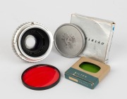 HASSELBLAD: Three camera accessories - one Carl Zeiss Tessar&nbsp;80mm f2.8 lens [#832623] for Hasselblad&nbsp;100F & 1600F cameras&nbsp;with metal front lens cap, one Hasselblad-G 3-50 green lens filter in maker's box, and one Hasselblad / 63 6 x R-2.5 red lens filter 