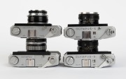 OLYMPUS: Four early-1960s rangefinders cameras - one Olympus Auto Eye [#130094] with D. Zuiko 45mm f2.8 lens [#132604], one Olympus Auto Eye II [#114235] with D. Zuiko 43mm f2.5 lens, one Olympus-S Electro Set [#103171], and one Olympus-SC [#144311] with - 4