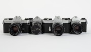 ASAHI KOGAKU: Four SLR cameras - one c. 1965 Pentax SL [#3011212] with Super-Takumar 55mm f1.8 lens [#4063340] and metal front lens cap, one c.1971 Pentax SP II [#5046356] with SMC Takumar 50mm f1.4 lens [#4652368], one c. 1973 Pentax SP-F [#6112861] with - 2