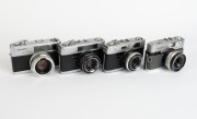MINOLTA: Four black and chrome rangefinder cameras - one c. 1959 Minolta A3 [#107799] with Rokkor-TE 45mm f2.8 lens [#1109470], one c. 1964 Minolta Uniomat III [#406766] with Rokkor 45mm f2.8 lens, one c. 1966 Minolta A5 [#432355]&nbsp;with Rokkor 45mm f2.8 le