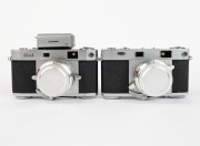 RIKEN: Five late-1950s rangefinder cameras - one Ricoh 35 [#63549] with Ricomat 45mm f3.5 lens,&nbsp;one type 1 Ricoh 500 [#21513] with Ricomat 45mm f2.8 lens and lens cap, one type 1&nbsp;Ricoh 500 [#21065] with Ricomat 45mm f2.8 lens,&nbsp;lens cap, and Ricoh Meter at - 2