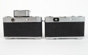 RIKEN: Five late-1950s rangefinder cameras - one Ricoh 35 [#63549] with Ricomat 45mm f3.5 lens,&nbsp;one type 1 Ricoh 500 [#21513] with Ricomat 45mm f2.8 lens and lens cap, one type 1&nbsp;Ricoh 500 [#21065] with Ricomat 45mm f2.8 lens,&nbsp;lens cap, and Ricoh Meter at - 3