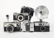 RIKEN: Six c. 1960s chrome-body cameras - one Ricoh Auto Shot, one Ricoh Caddy, one Ricoh Caddy with lens cap and BC-605 flash unit, one Ricoh Auto Half [#321569], one Ricoh 126-C EE [#205861] with Ricoh self-timer attachment, and one Ricohmatic 126 with - 2