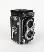 FRANKE & HEIDECKE: Black-body Rolleiflex T TLR camera [#2166036], c. 1959, with Carl Zeiss Tessar 75mm f3.5 lens [#3487177] and Synchro-Compur shutter.