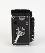 FRANKE & HEIDECKE: Black-body Rolleiflex T TLR camera [#2166036], c. 1959, with Carl Zeiss Tessar 75mm f3.5 lens [#3487177] and Synchro-Compur shutter. - 3