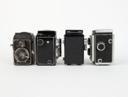VARIOUS MANUFACTURERS: A selection of four TLR cameras - one c. 1936 Eho-Altissa&nbsp;Altiflex II, one c. 1950 SEM Semflex, one c. 1954 Bolta Photina Reflex, and one c. 1955 United States Cameras Auto Fifty. (4 cameras) - 2