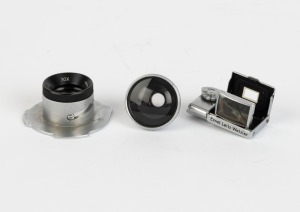 LEITZ: Three late 1930s Leica attachments in chrome - one SEROO sports finder, one LWHOO magnifier, and one TUVOO adapter for VIOOH viewfinder. (3 items)