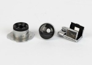 LEITZ: Three late 1930s Leica attachments in chrome - one SEROO sports finder, one LWHOO magnifier, and one TUVOO adapter for VIOOH viewfinder. (3 items)