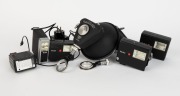 FRANKE & HEIDECKE: Eight flash accessories in black - two Rolleiflash with differing diameters plus one additional camera attachment element, one Strobomatic E 17C with power cable,&nbsp;one 121BC with sync cable, one 100 XL,&nbsp;one 128BC, and one E 19 BC. (8 ite