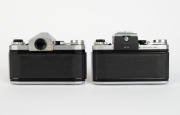 TOKYO KOGAKU: Two c. 1957 SLR cameras - one Topcon R [#154249] with Auto-Topcor 58mm f1.8 lens [#288105], and one Topcon R [#154532] with Auto-Topcor 58mm f1.8 lens [#286944] and waist-level viewfinder. (2 cameras) - 3