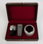 ZEISS IKON: Two lens accessory kits for Movikon 8 in leather-lined maker's boxes - one Movitelar&nbsp;5532/05&nbsp;viewfinder with lens attachment, hood, and instruction booklet, together with one Movigonar 5532/04 viewfinder with lens attachment and hood.&nbsp;(2 items - 2