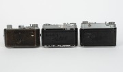 KODAK: Three vertical-folding cameras - one c. 1937 Retina I 141 with Ektar 50mm f3.5 lens [#1250712], one c. 1949 Retina II 014 with Retina-Xenon 50mm f2 lens [#2203286] in maker's box, and one Retina Ia 015 with Retina-Xenar 50mm f2.8 lens [#3254034].&nbsp;( - 3