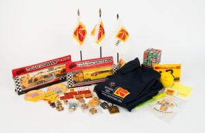 KODAK: Thirty-six Kodak-branded items, including ten pins, nine badges, three keyrings, two matchbox cars in maker's boxes, two puzzle cubes, three small flags on poles, one polo-shirt, and others. (36 items)