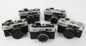 RIKEN: Five c. 1970s rangefinder cameras - one Ricoh 500 G with Rikenon 40mm f2.8 lens, one Ricoh 500 GX with Color Rikenon 40mm f2.8 lens and lens cap, one Ricoh 35 ZF with Rikenon 40mm f2.8 lens and lens cap, one Ricoh 500 ZF with Color Rikenon 40mm f2.8 lens, and one Ricoh 800 EES with Rikenon 40mm f2.8 lens. (5 cameras)