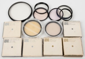 HOYA: An accumulation of fourteen lens filters of various diameters and colours, of which two in plastic cases, and six in maker's boxes with plastic cases and instruction sheets. (14 items)