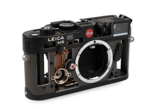 LEITZ: Black Leica M6 camera body cutaway model [#191668], c. 1988.