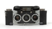 WHITE: Stereo Realist Model 1041 stereo camera [#A41427], c. 1950, with dual f3.5 lenses. Unusual design with viewfinder at bottom of camera and integrated flip-up lens cap. - 2
