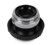 CARL ZEISS: Biogon 35mm f2.8 lens [#1883819] with Contax&nbsp;IIa/IIIa mount, c. 1956, together with rear lens cap.