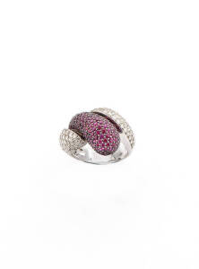 RING: 18ct white gold pave diamond and ruby ring. 15.66 grams.