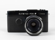 OLYMPUS: Black-body Pen FT half-frame SLR camera [#329944], c. 1967, with D. Zuiko Auto-S 38mm f2.8 lens [#100904] and Olympus S-45 lens hood. - 2